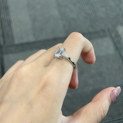 Emerald cut CVD diamond three stone engagement ring