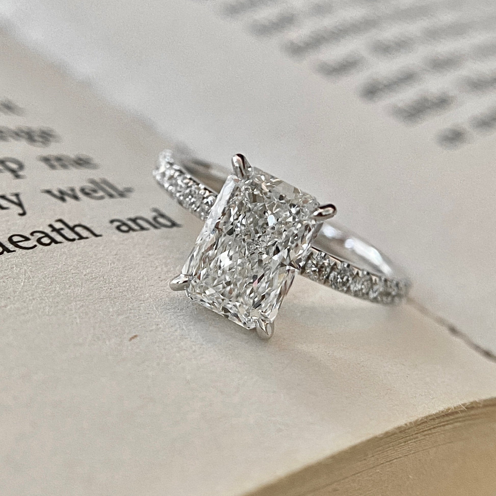 Radiant cut CVD lab grown diamond pave engagement ring with elegant sparkle