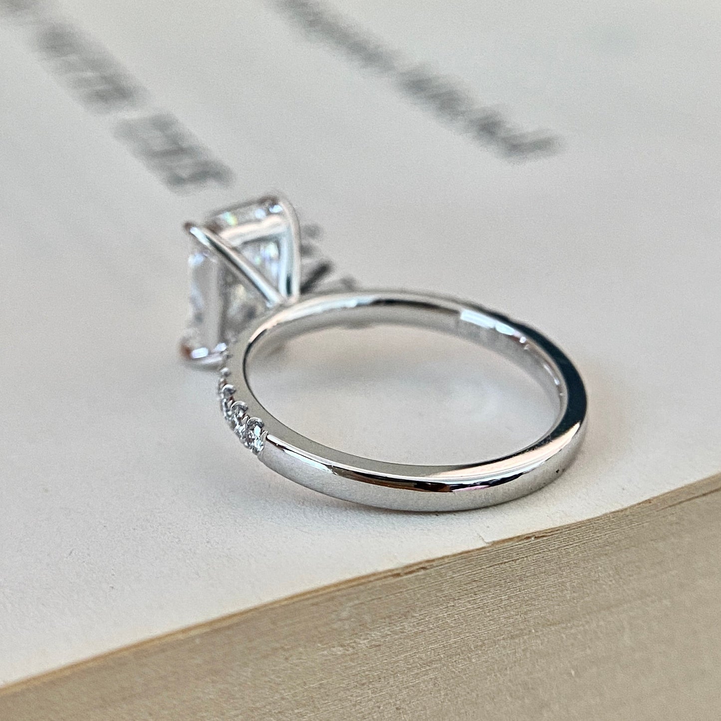 Radiant cut CVD lab grown diamond pave engagement ring with elegant sparkle