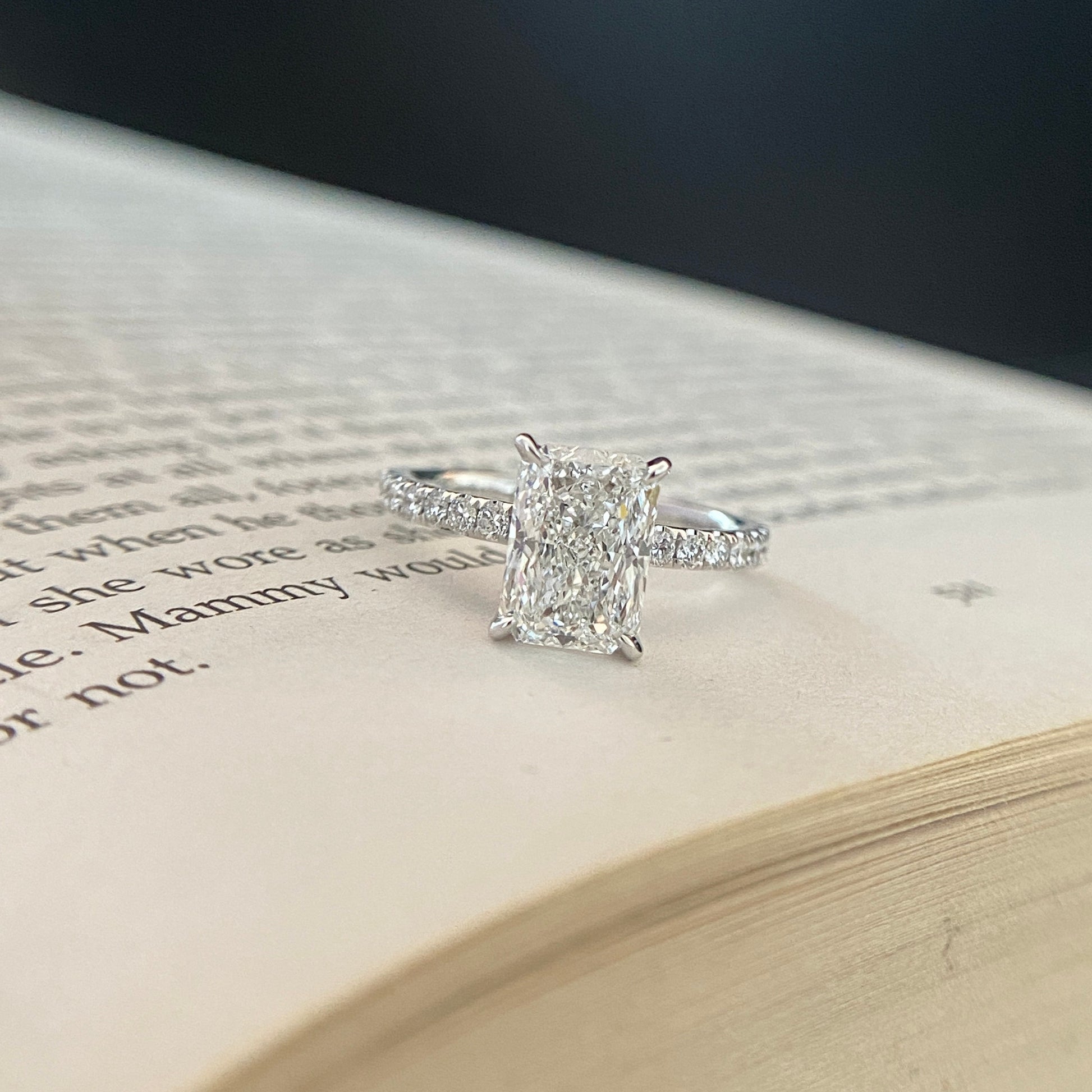 Radiant cut CVD lab grown diamond pave engagement ring with elegant sparkle