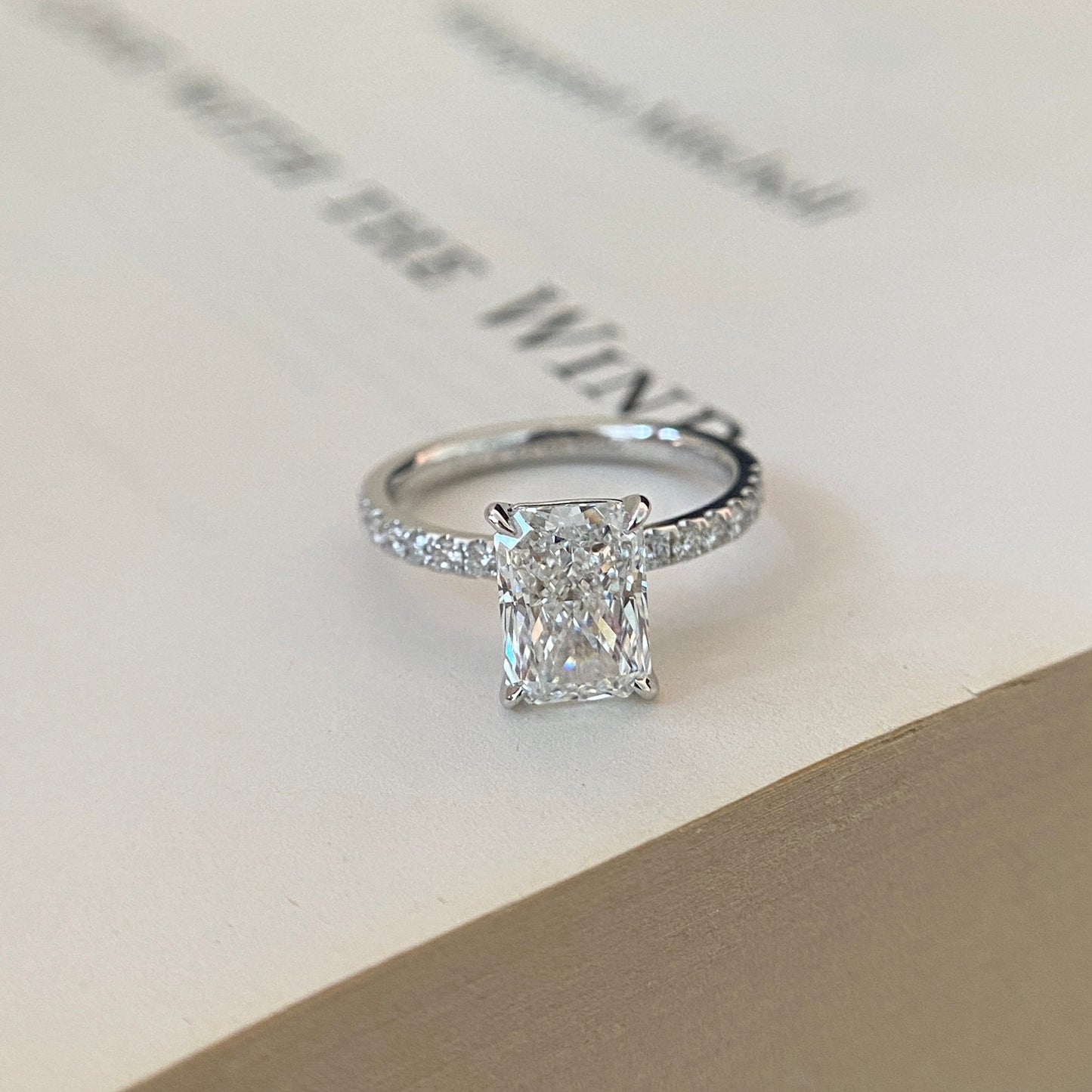 Radiant cut CVD lab grown diamond pave engagement ring with elegant sparkle