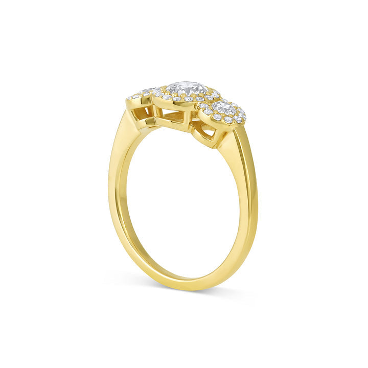 Three stone halo engagement ring with round cut moissanite
