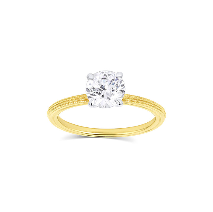 Round moissanite solitaire engagement ring with elegant band