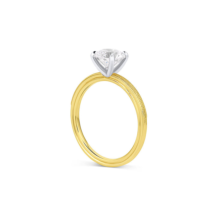 Round moissanite solitaire engagement ring with elegant band