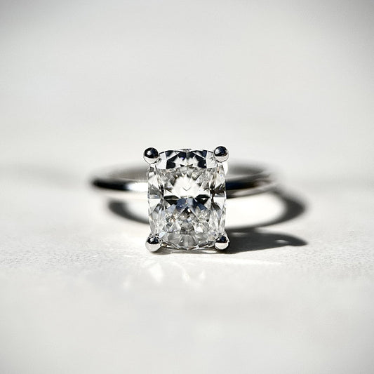 2.0 CT cushion cut CVD lab grown diamond solitaire engagement ring with E color, VS1 clarity, set in white gold with classic prong setting