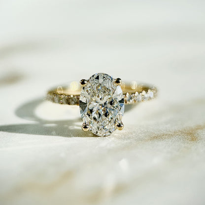 1.80 CT oval cut CVD lab grown diamond engagement ring with hidden halo, pave-set band, E color, VS1 clarity, in white gold setting
