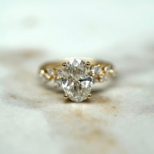 1.50 CT oval cut CVD lab grown diamond engagement ring with cluster setting, E color, VS1 clarity, in white gold