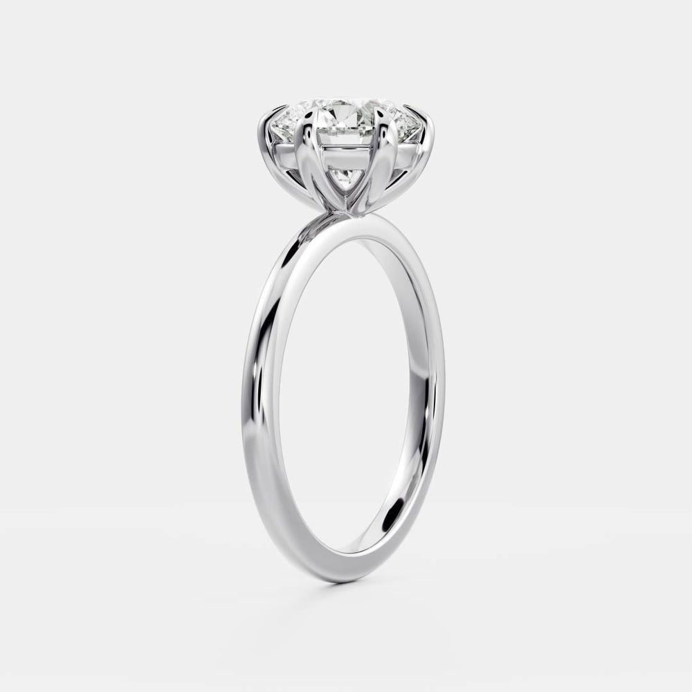 Classic solitaire ring with round moissanite center stone
