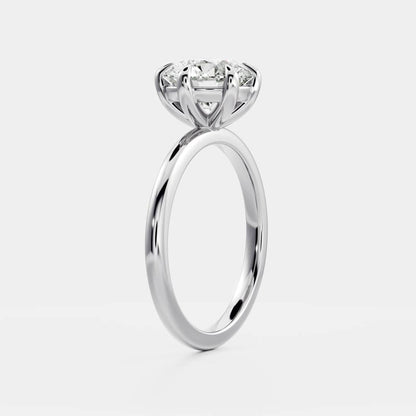 Classic solitaire ring with round moissanite center stone