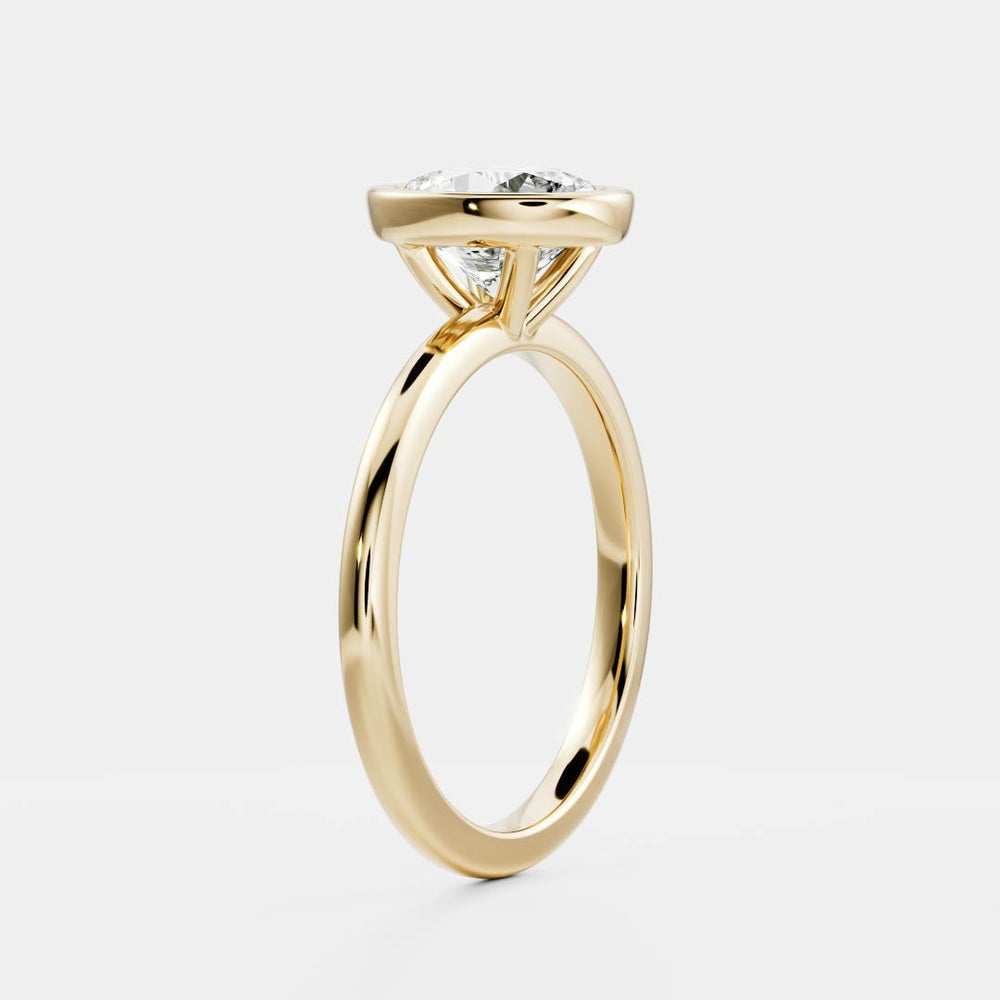 Bezel engagement ring with oval moissanite center stone