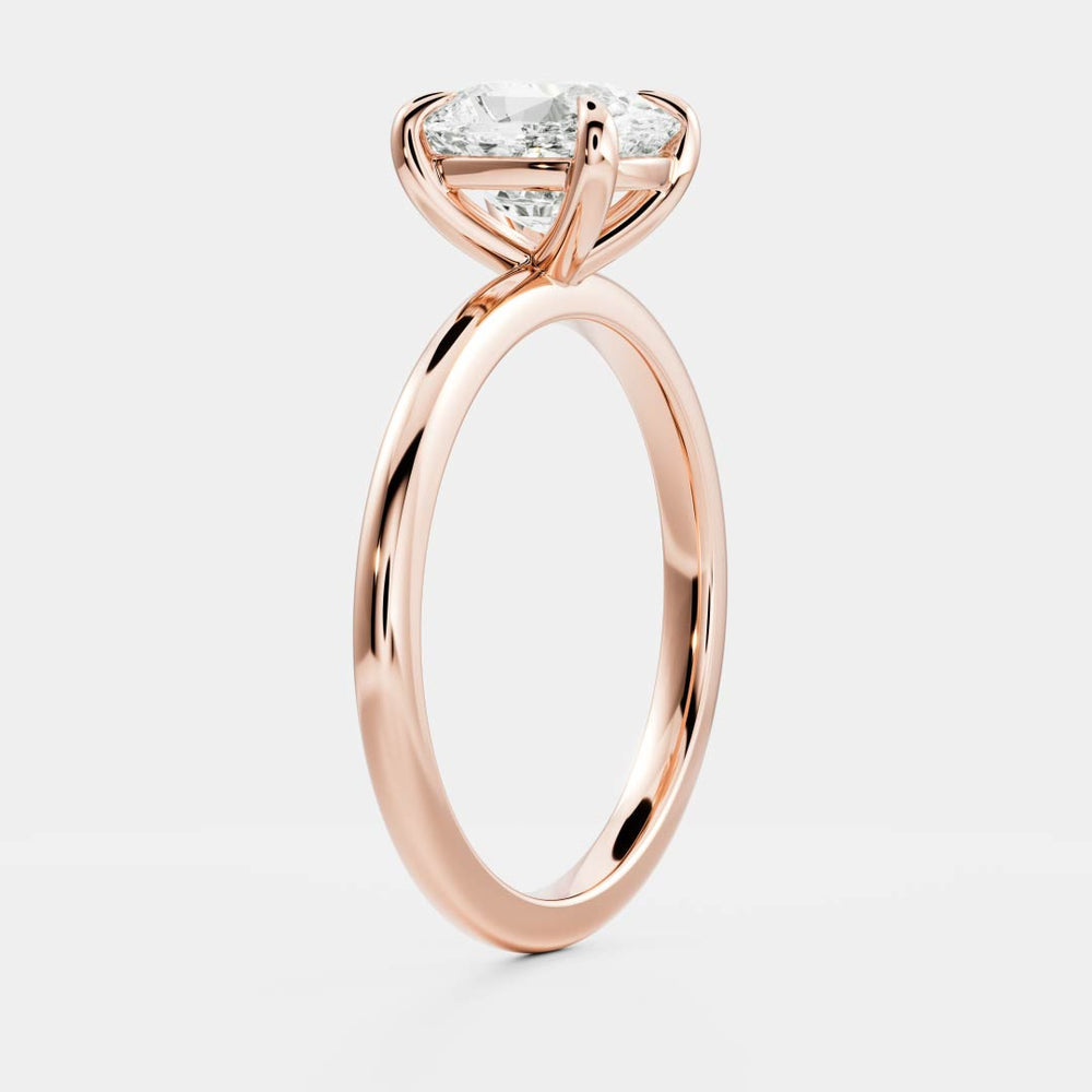 Solitaire engagement ring with cushion-cut moissanite center stone