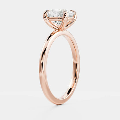 Solitaire engagement ring with cushion-cut moissanite center stone