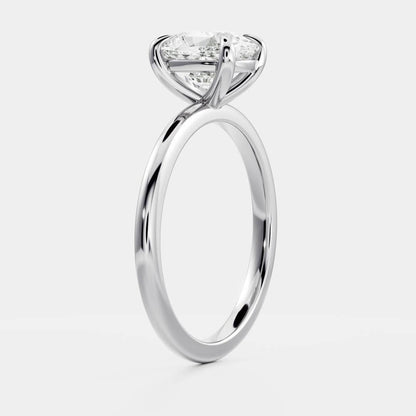 Solitaire engagement ring with cushion-cut moissanite center stone