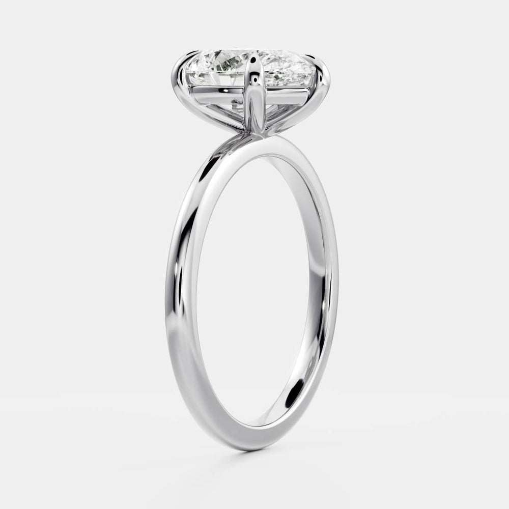 Elegant solitaire ring with pear-shaped moissanite center stone