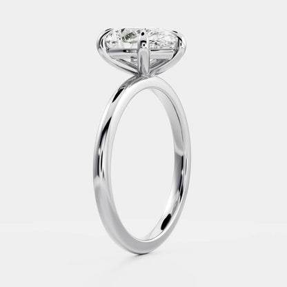 Elegant solitaire ring with pear-shaped moissanite center stone