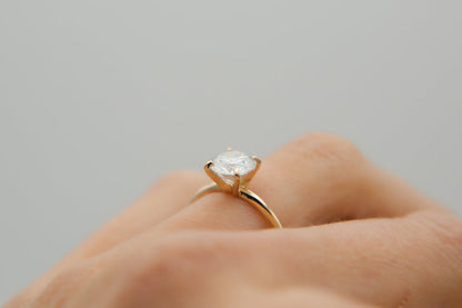 Round cut moissanite solitaire engagement ring