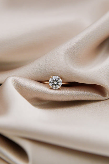 Round cut moissanite solitaire engagement ring