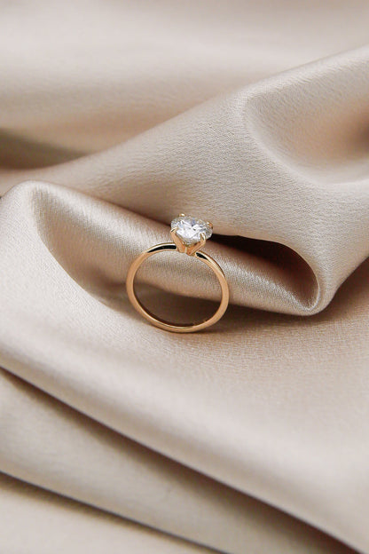 Round cut moissanite solitaire engagement ring