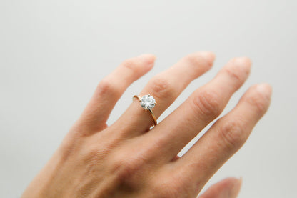 Round cut moissanite solitaire engagement ring