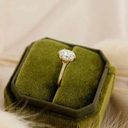 Elegant solitaire engagement ring with oval cut moissanite