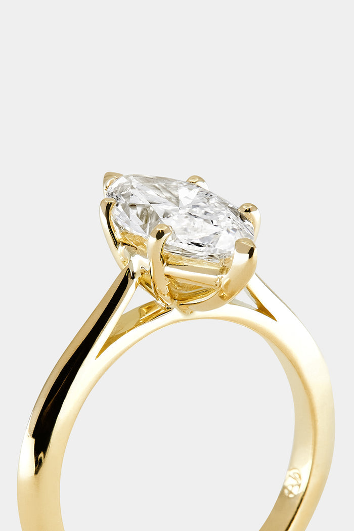 Solitaire Ring with 0.80 CT Marquise Cut Moissanite