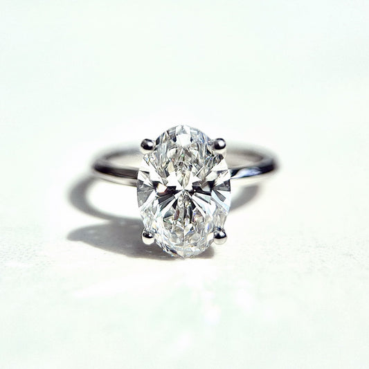 1.0–3.0 CT oval cut CVD lab grown diamond engagement ring with hidden halo, E color, VS1 clarity, in polished white gold setting

