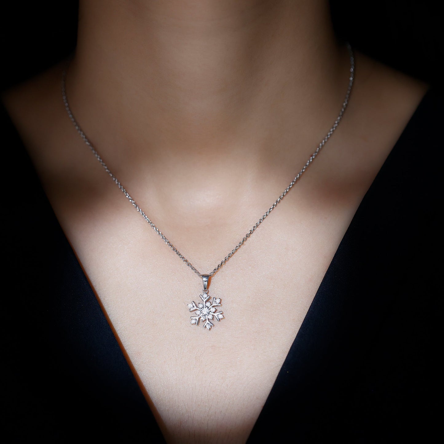 Snowflake Necklace with 0.57 TCW Round Cut Moissanite