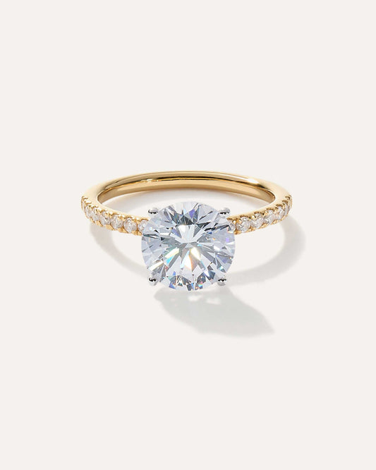Round cut CVD lab grown diamond engagement ring with pave-set band for extra sparkle in a classic solitaire style setting