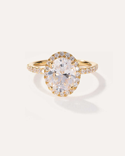 Oval cut CVD lab grown diamond halo pave engagement ring with delicate side stones and polished band for lasting elegance