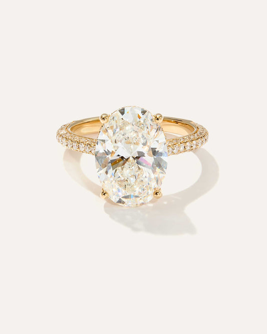 Oval cut CVD lab grown diamond engagement ring with hidden halo and pave setting for modern timeless elegance