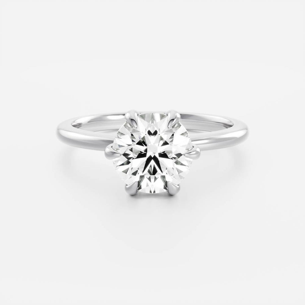Classic solitaire ring with round moissanite center stone