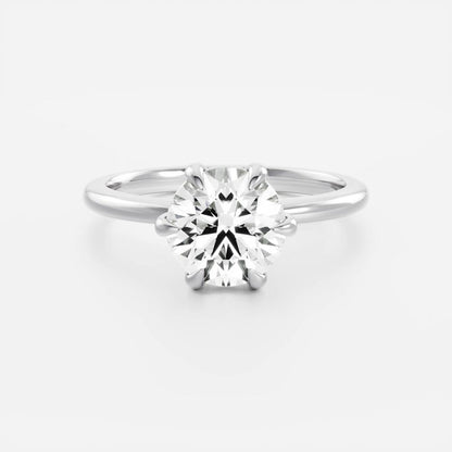 Classic solitaire ring with round moissanite center stone