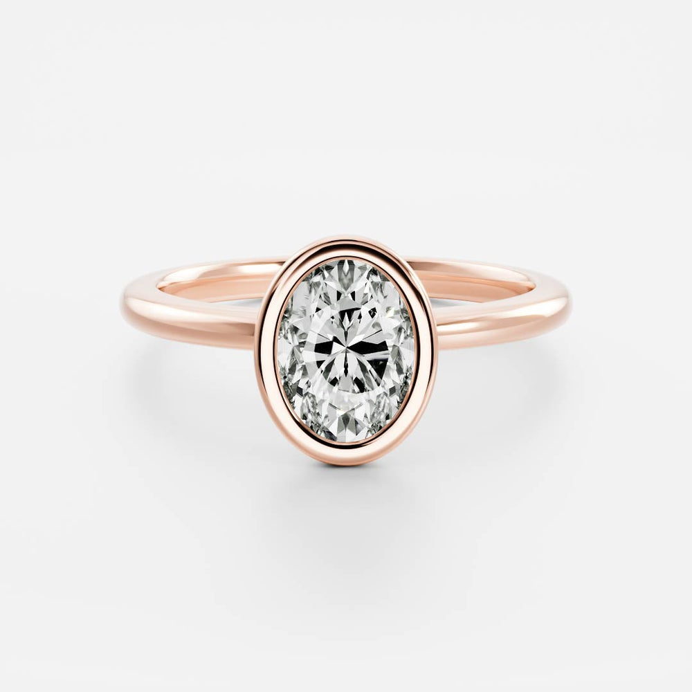 Bezel engagement ring with oval moissanite center stone