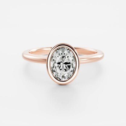 Bezel engagement ring with oval moissanite center stone