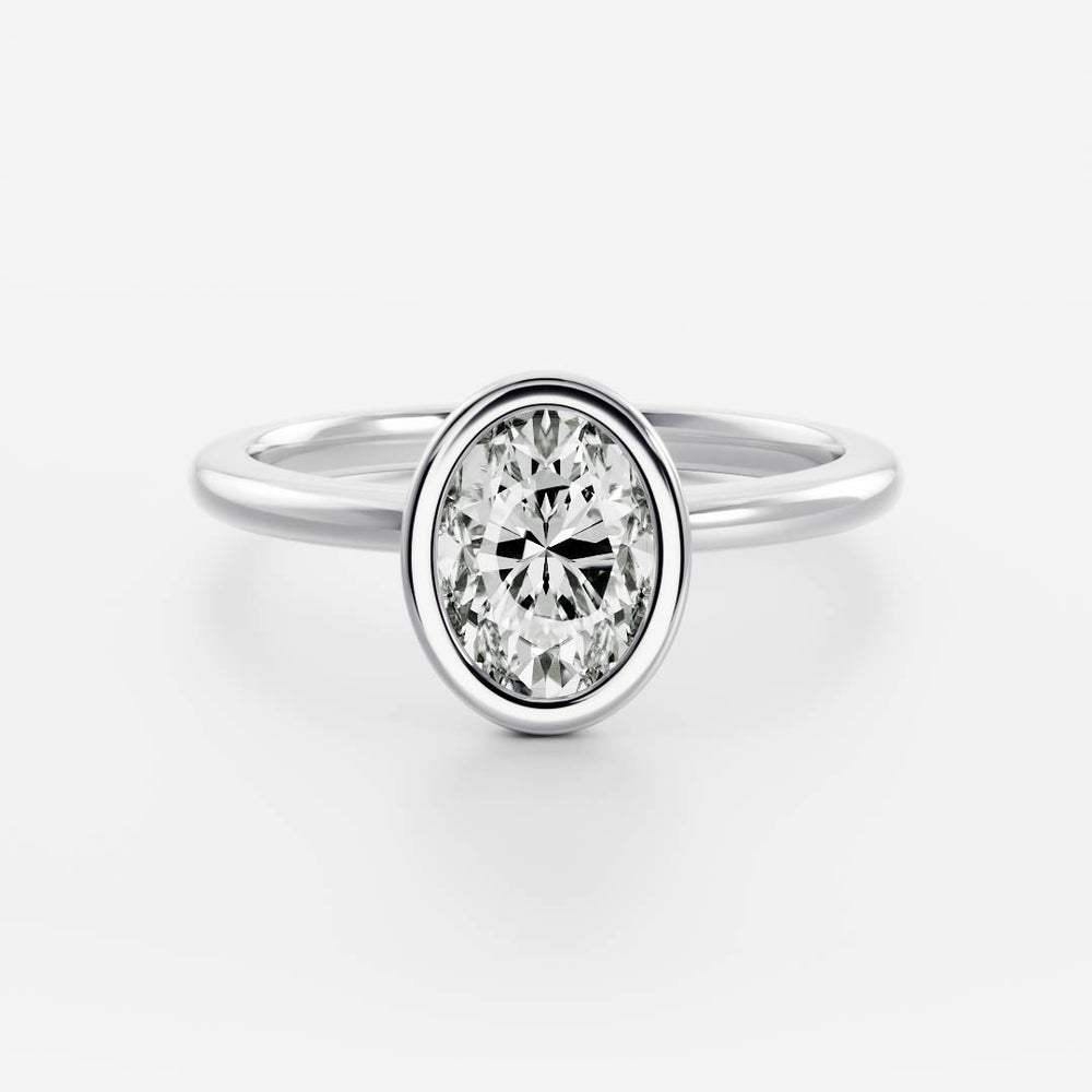 Bezel engagement ring with oval moissanite center stone