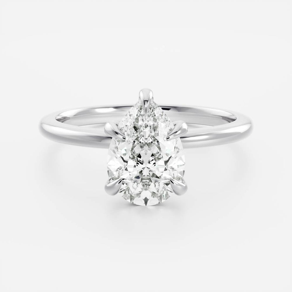 Elegant solitaire ring with pear-shaped moissanite center stone