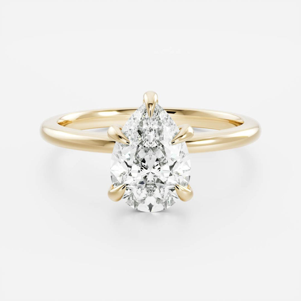 Elegant solitaire ring with pear-shaped moissanite center stone