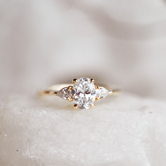 Three Stone Ring with 1.50 Ct Oval Moissanite
