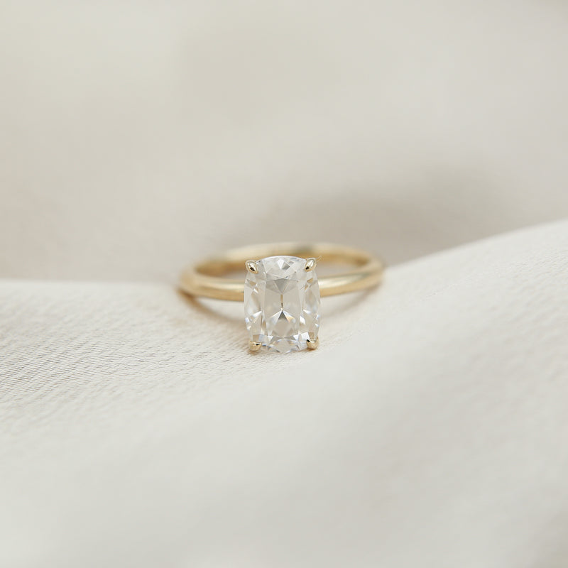 Elongated cushion cut moissanite solitaire engagement ring