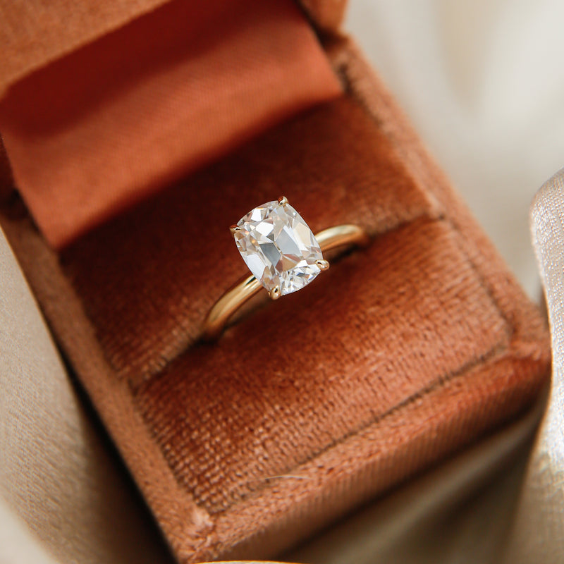 Elongated cushion cut moissanite solitaire engagement ring