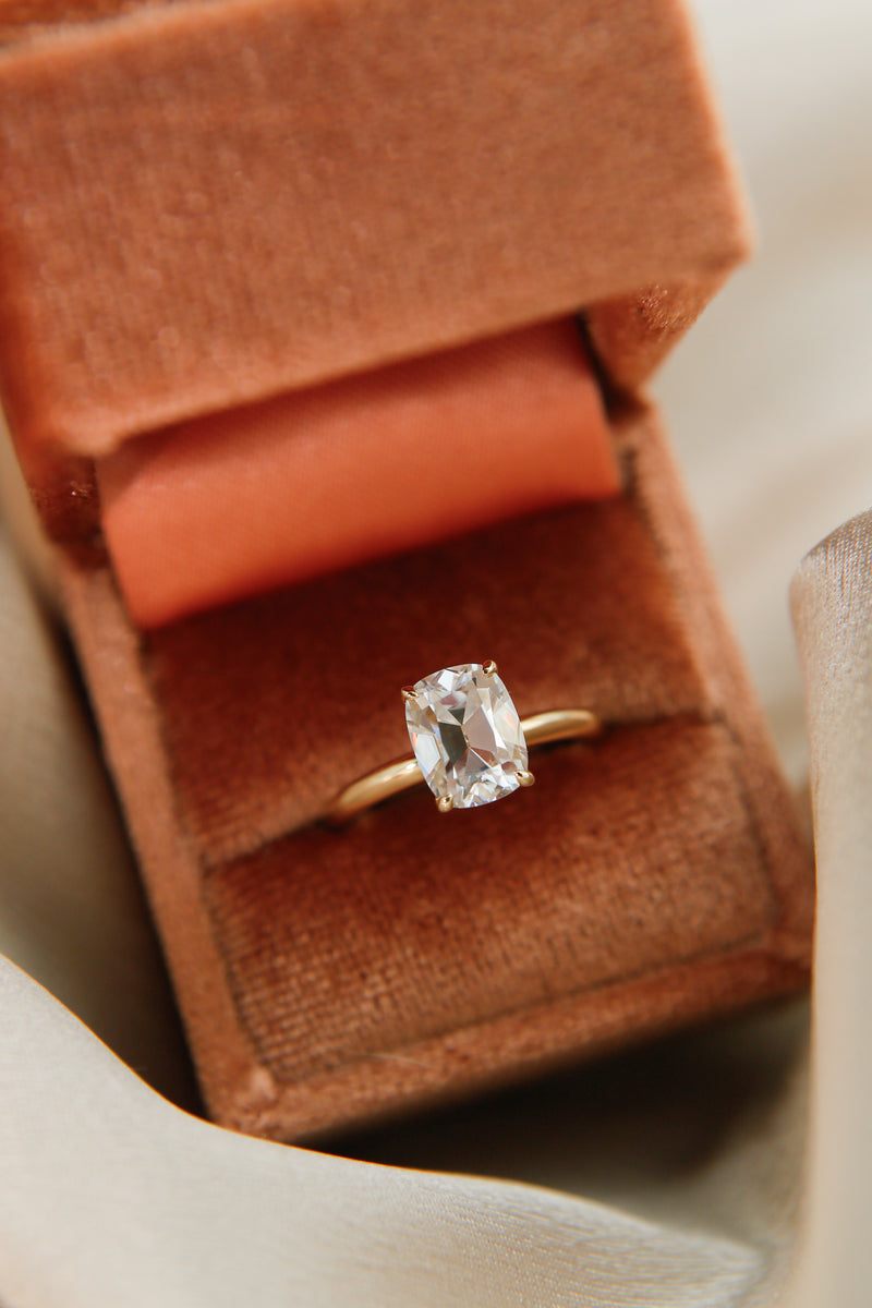 Elongated cushion cut moissanite solitaire engagement ring