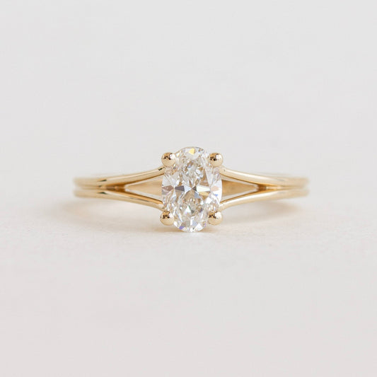 Oval cut CVD lab grown diamond engagement ring featuring a split shank band with pavé accents for added brilliance