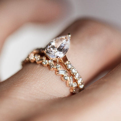 Pave Setting Ring with 1.50 CT Pear Moissanite