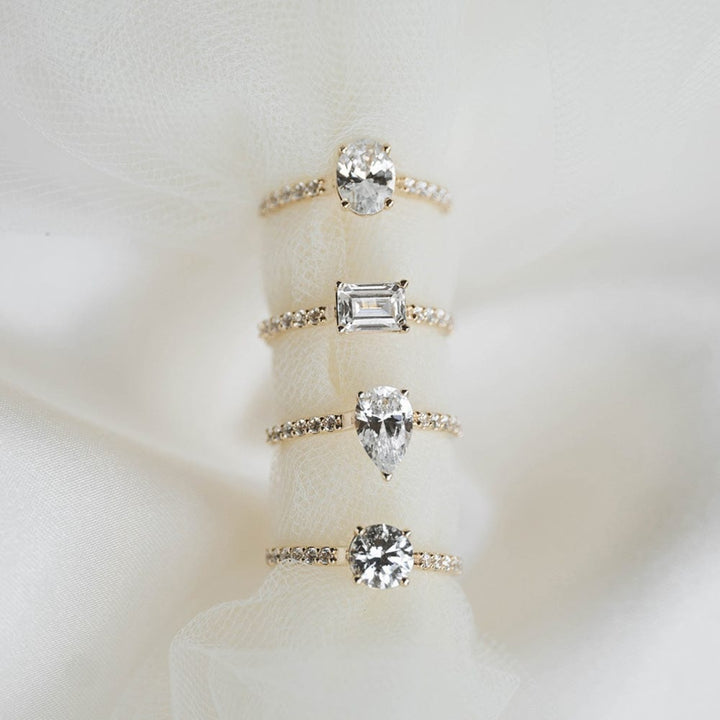 Pave Setting Ring with 1.50 CT Pear Moissanite