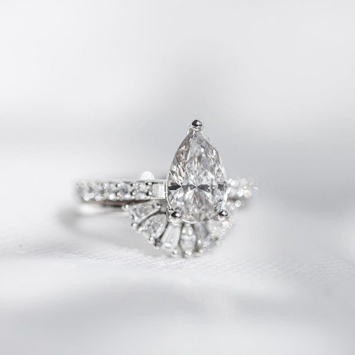 Pave Setting Ring with 1.50 CT Pear Moissanite