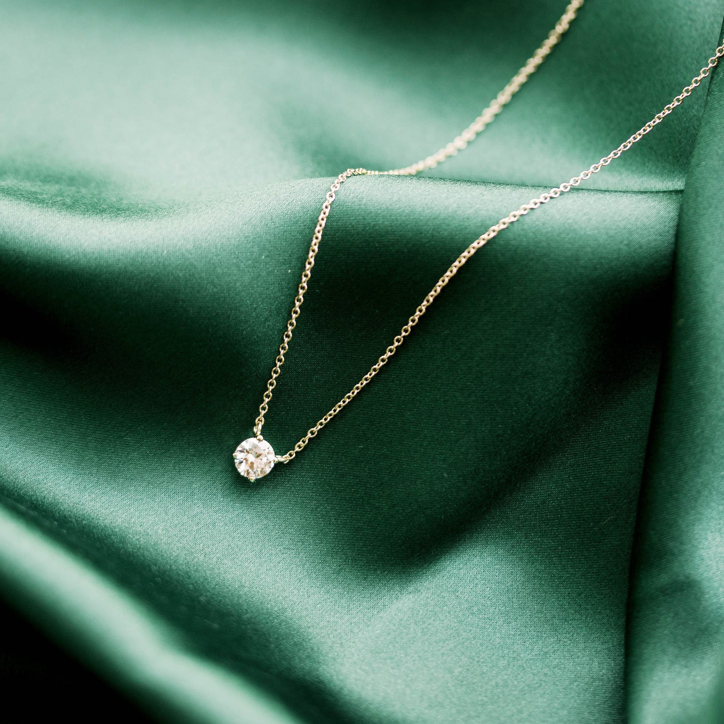 Solitaire Necklace with 1.0 CT Floating Round Cut Moissanite