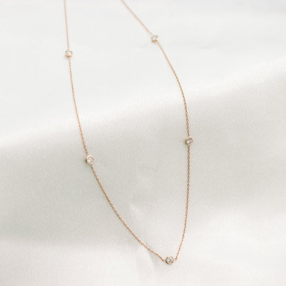 Five Bezel Necklace with 0.25 TCW Floating Cosmopolitan Round Cut Moissanite