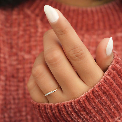 Curved Wedding Band with 0.05 TCW Round Cut Moissanite