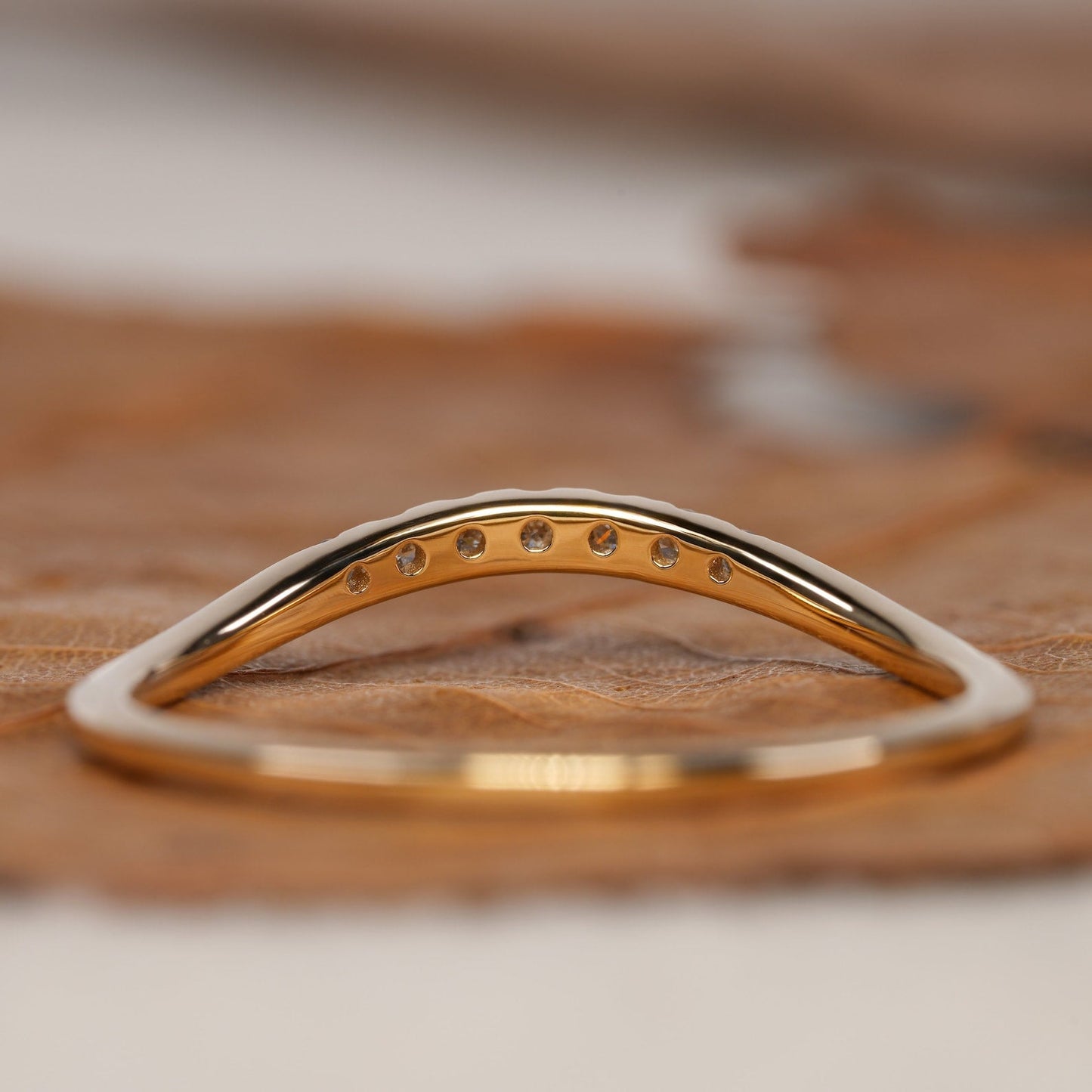 Curved Wedding Band with 0.05 TCW Round Cut Moissanite