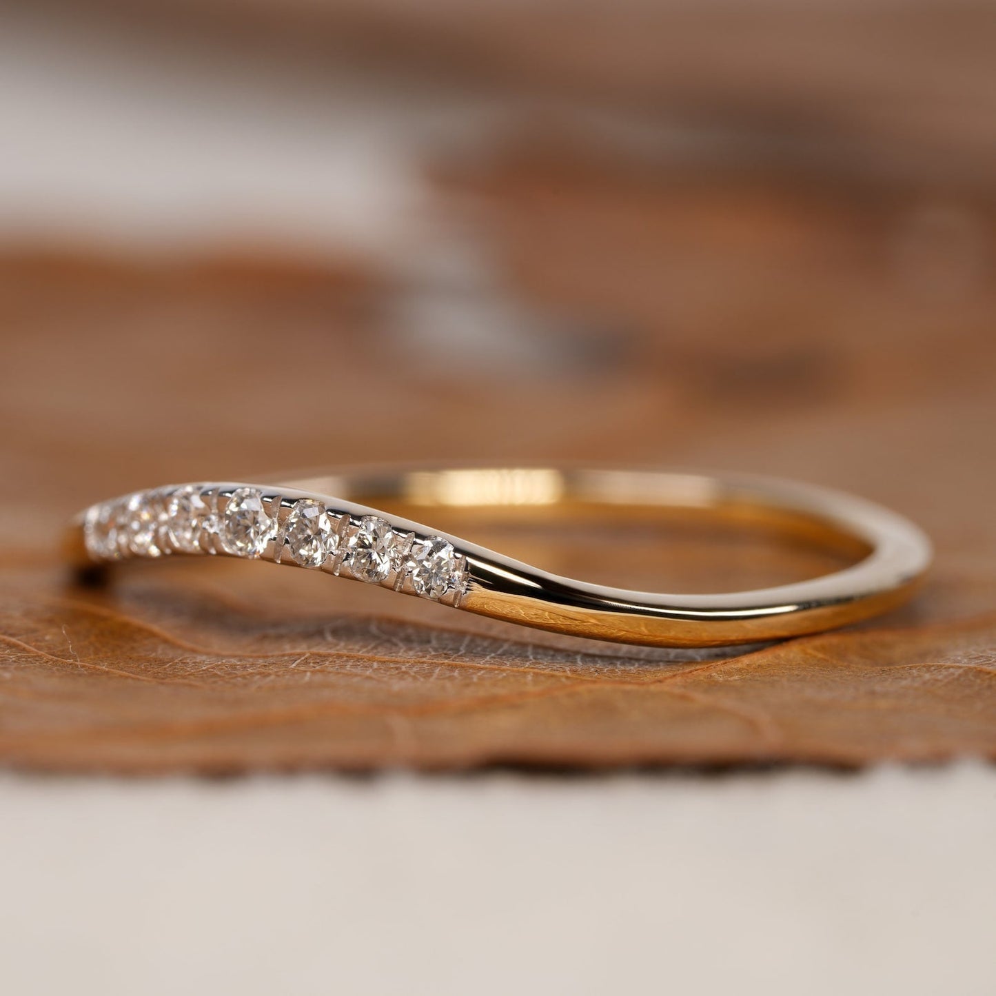 Curved Wedding Band with 0.05 TCW Round Cut Moissanite